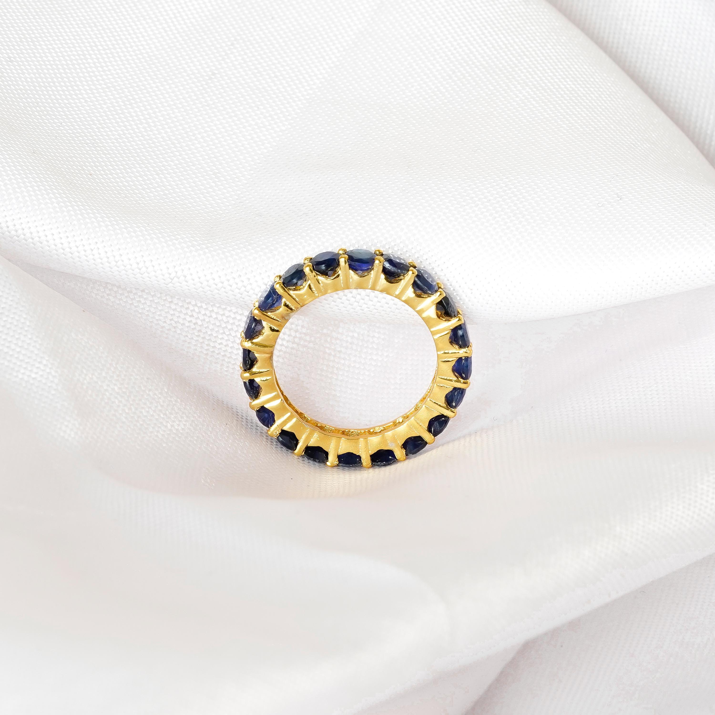 Womens Blue Sapphire Wedding Band with blue sapphires