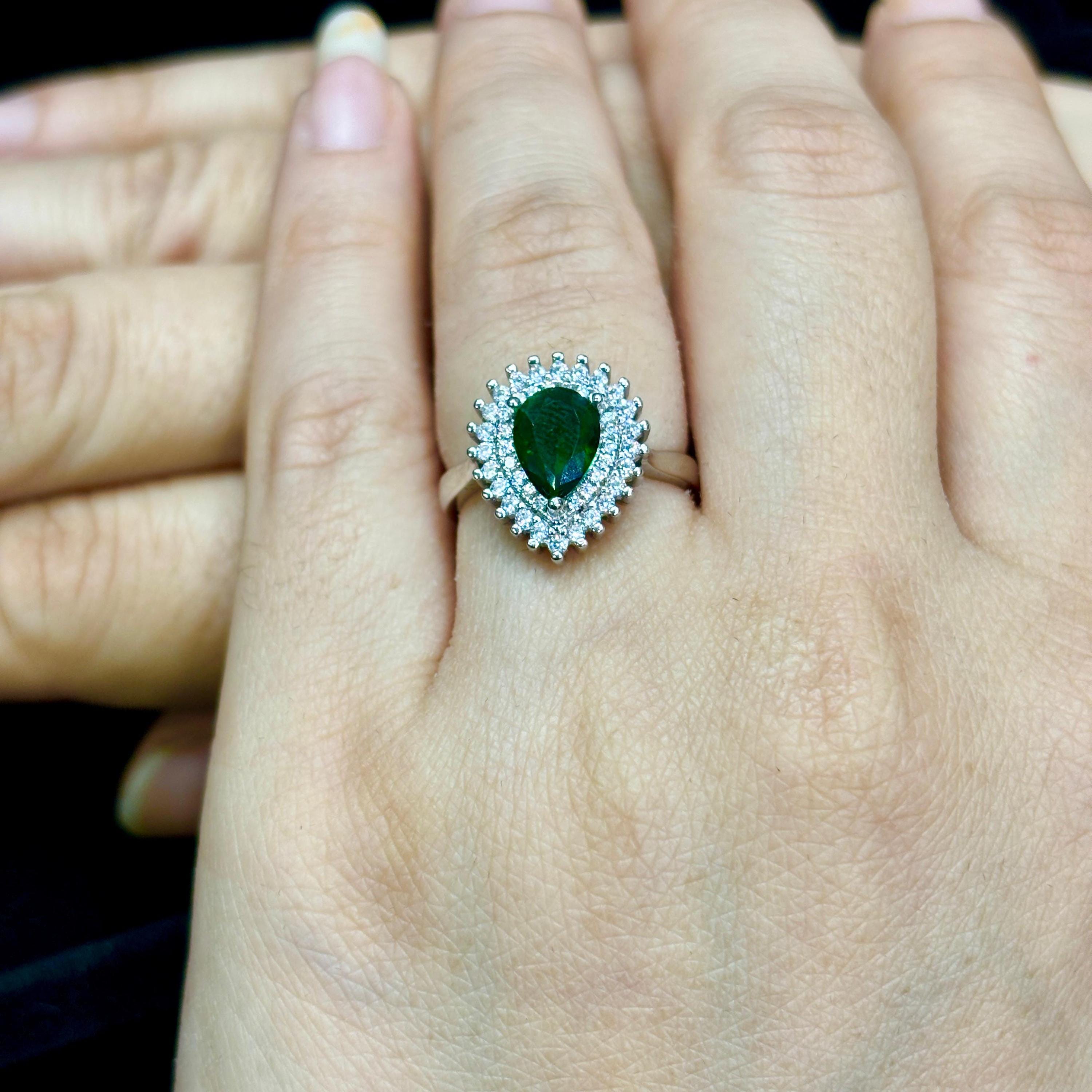 Pear Emerald Engagement Ring on hand