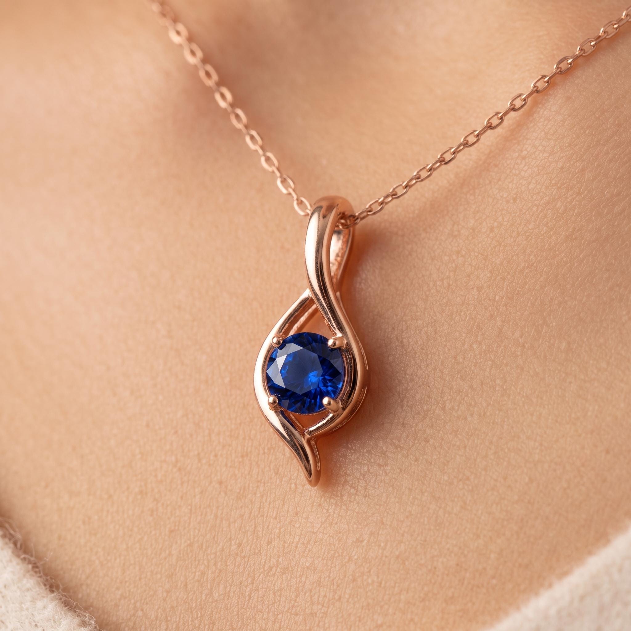 Lab-Created Blue Sapphire Moissanite Pendant, Rose Gold Sterling Silver Twist Charm Necklace
